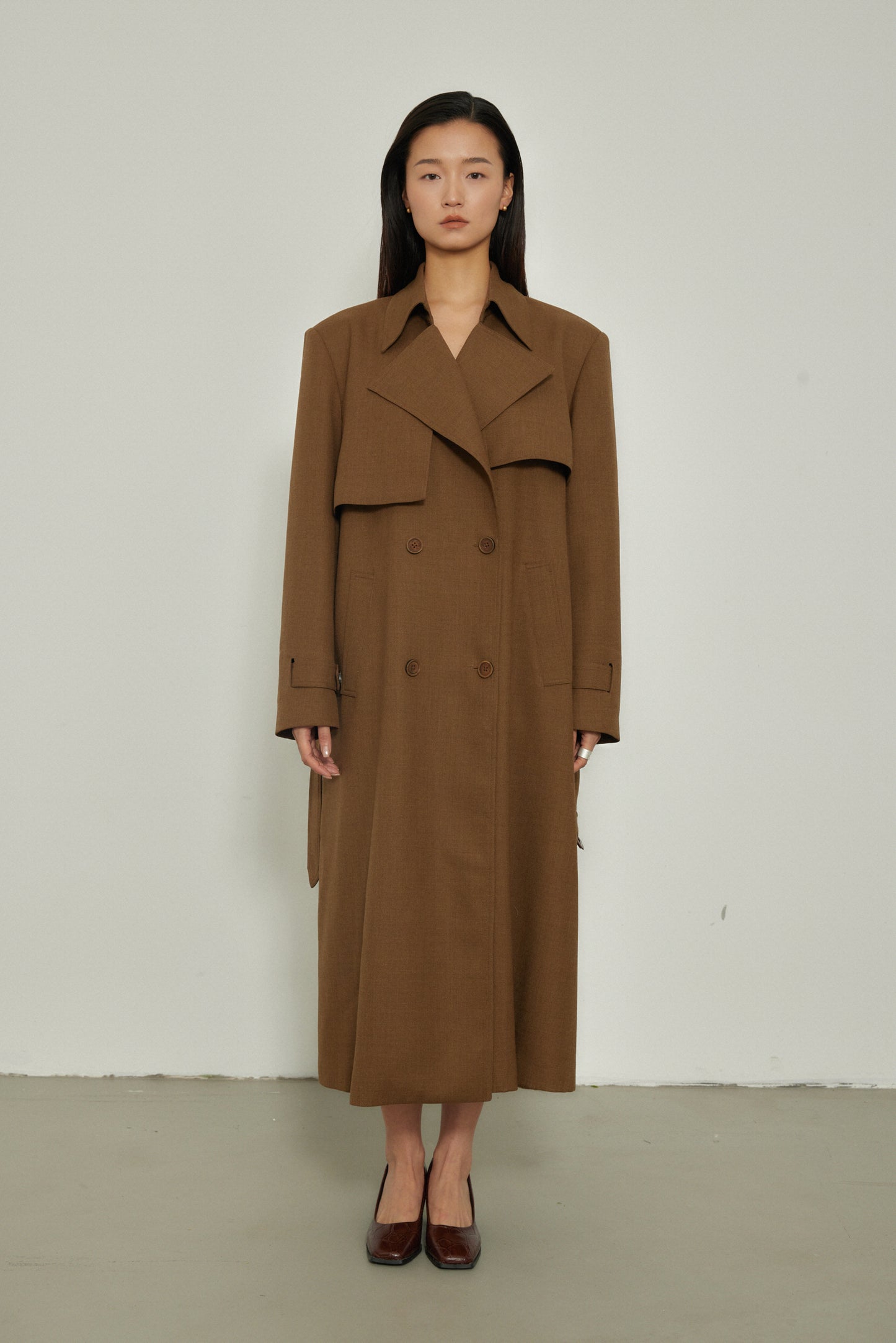 Manteau long design croisé au dos