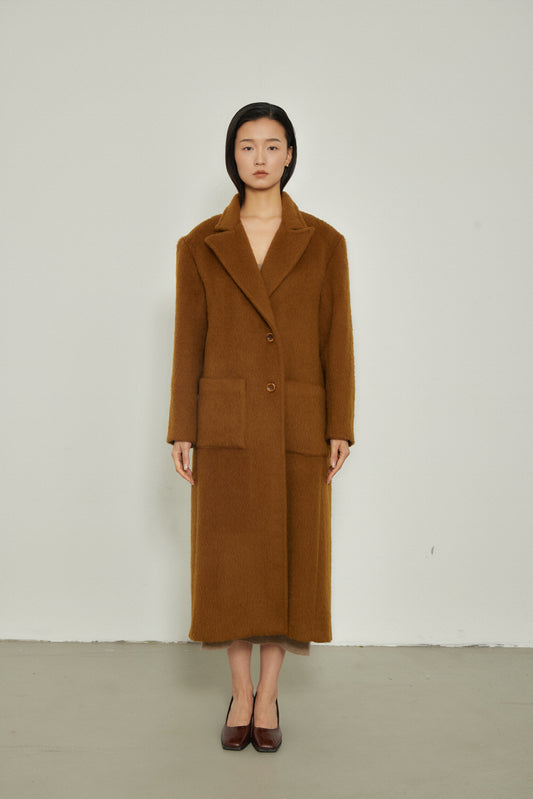 Manteau long design spécial au dos