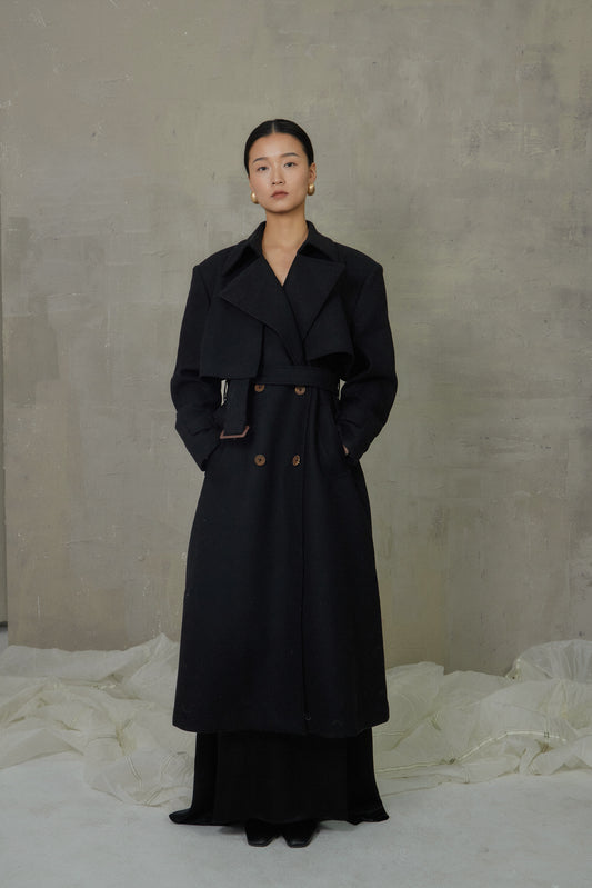 Manteau long design croisé au dos
